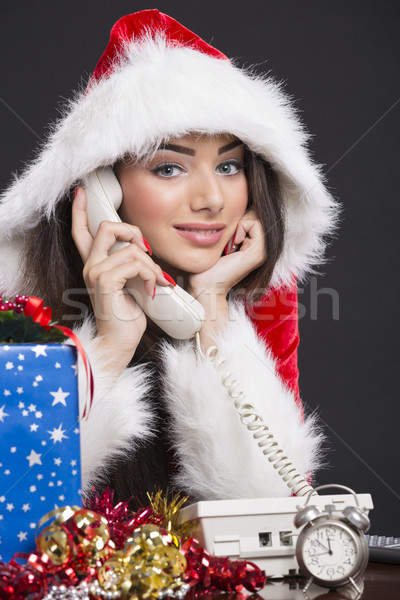 Mosolyog mikulás lány telefon portré beszél Stock fotó © photosebia