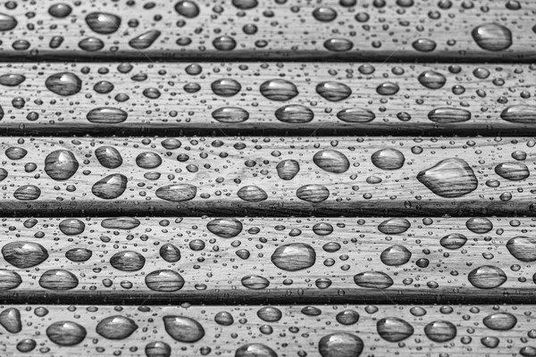 Water drops on wooden board Stock photo © photosebia