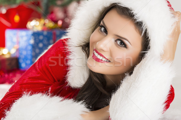 Smiling lady in Santa outfit Stock photo © photosebia