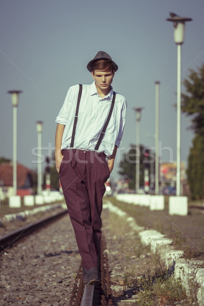 Guy in balance on a rail Stock photo © photosebia