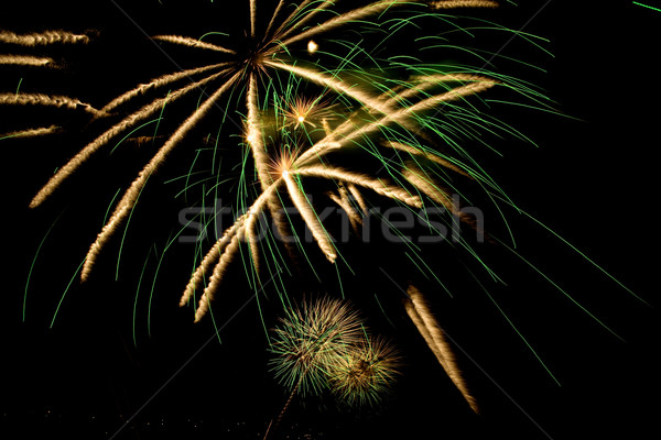 Tűzijáték fényes színes fekete fény háttér Stock fotó © photosil