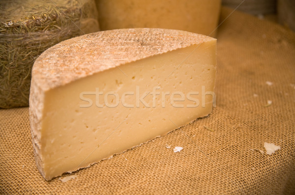 Cheeses on market stall Stock photo © photosil