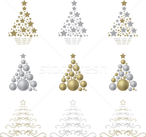 A selection of gold and silver stylised Christmas trees Stock photo © piccola