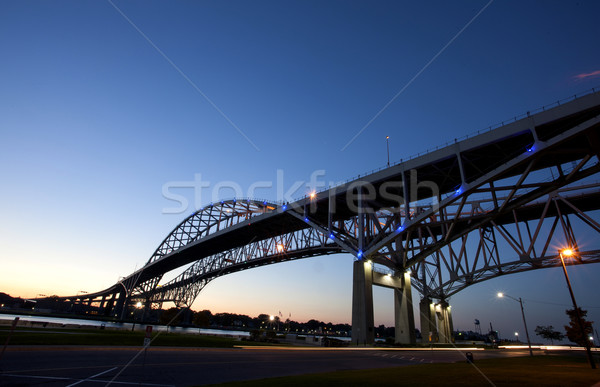 Noite foto azul água ponte Foto stock © pictureguy