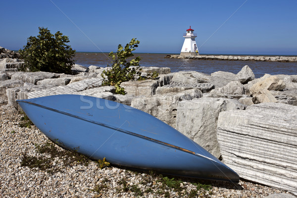 Farol lago rochas azul canoa Foto stock © pictureguy