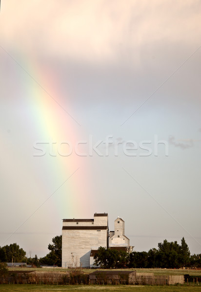 Rainbow touching down behind Bengough Saskatchewan Stock photo © pictureguy