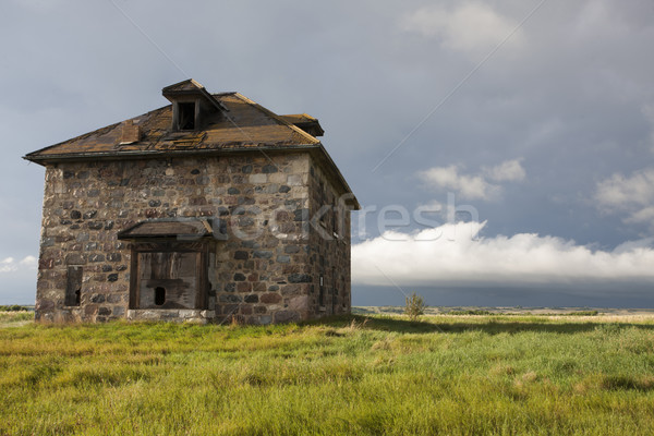 Nuages ​​d'orage prairie ciel pierre maison Canada [[stock_photo]] © pictureguy