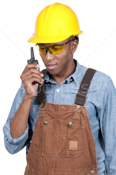 építőmunkás jóképű afroamerikai férfi beszél adóvevő épület Stock fotó © piedmontphoto