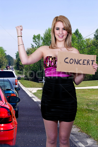 Woman Hitch Hiking to a Concert Stock photo © piedmontphoto