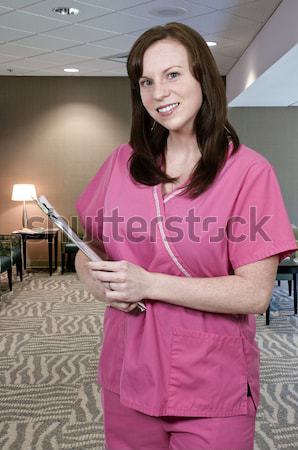 Mulher médico belo jovem feminino feliz Foto stock © piedmontphoto