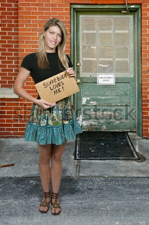 Woman Holding a Sign Stock photo © piedmontphoto