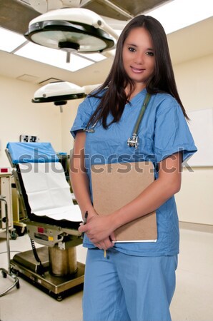 Femeie cardiolog femeie medic roşu Imagine de stoc © piedmontphoto