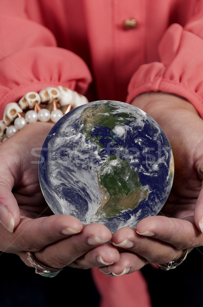 Woman holding Earth Stock photo © piedmontphoto