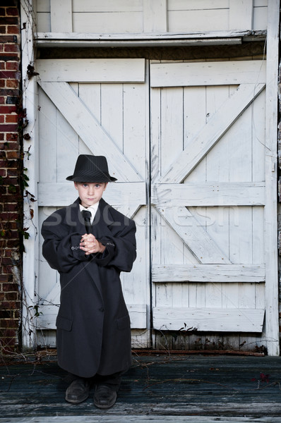 Boy in Oversized Clothes Stock photo © piedmontphoto