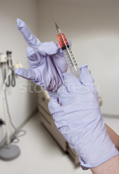 Orvosi injekciós tű egészségügy munkás tart egészség Stock fotó © piedmontphoto