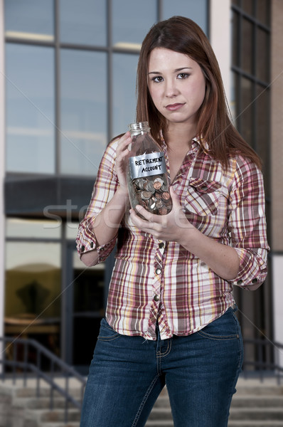 Frau halten Ruhestand Konto schöne Frau Münzen Stock foto © piedmontphoto