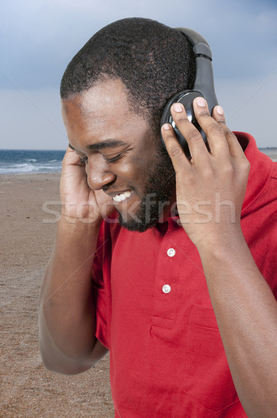 Stock photo: Man listening to Headphones