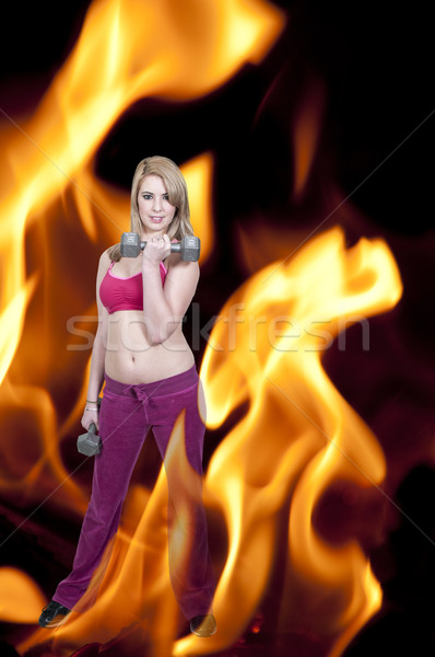 Stock photo: Woman Working with Weights