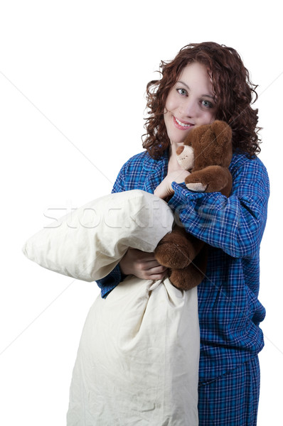 Stock photo: Woman Hugging Teddy Bear and Pillow