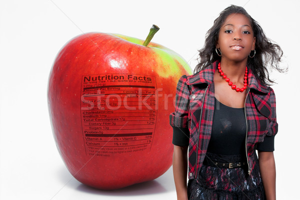 African American Teenager Apple Nutrition Facts Stock photo © piedmontphoto