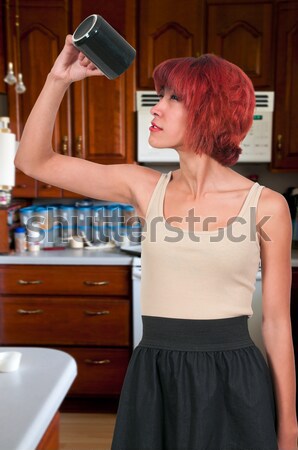 Woman Holding Frying Pan Stock photo © piedmontphoto