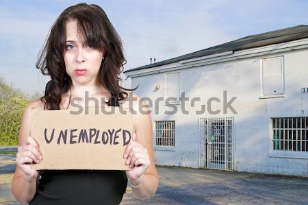 Vrouw werkloosheid teken mooie jonge vrouw Stockfoto © piedmontphoto