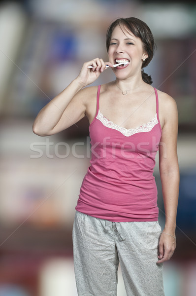 Beautiful Woman Brushing Teeth Stock photo © piedmontphoto