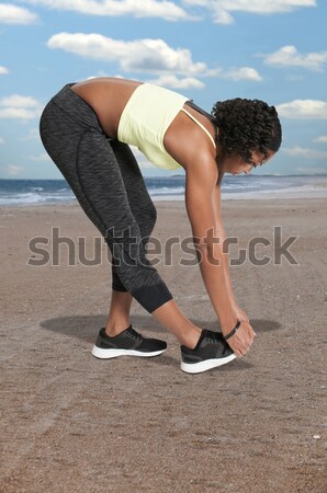 Beautiful Woman Taking Off Shoes Stock photo © piedmontphoto