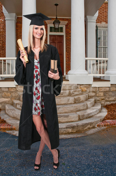 Afgestudeerde jonge vrouw afstuderen vrouw student jonge Stockfoto © piedmontphoto