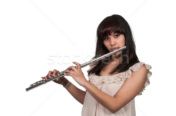 Mujer hermosa jugando instrumento flauta Foto stock © piedmontphoto