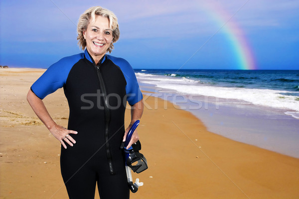 Scuba Frau älter wet Anzug Maske Stock foto © piedmontphoto