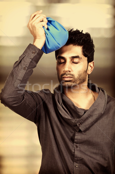 Homem dor de cabeça bonito africano americano gelo empacotar Foto stock © piedmontphoto