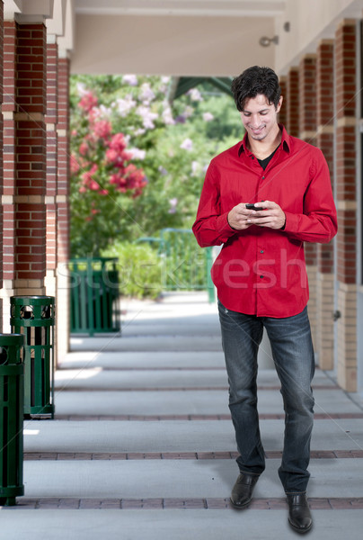 Hombre hombre guapo teléfono celular Internet edificio Foto stock © piedmontphoto