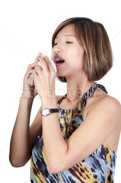 Asian Woman Blowing Nose Stock photo © piedmontphoto