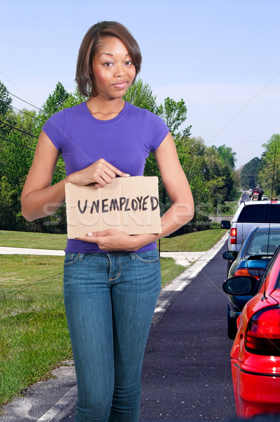 Vrouw werkloosheid teken mooie jonge vrouw Stockfoto © piedmontphoto