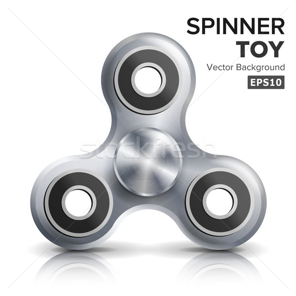 Hand Spinner Toy. Steel color. Fidgeting Hand Toy For Stress Relief And Improvement Of Attention Spa Stock photo © pikepicture
