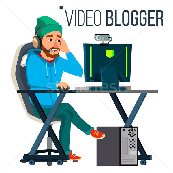 [[stock_photo]]: Homme · vidéo · blogger · vecteur · écouter