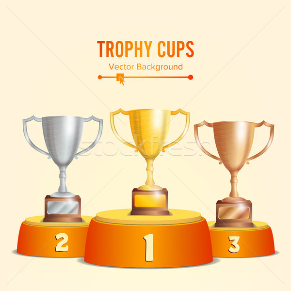 Trophy Cups On Podium. Golden, Bronze, Silver. Winners Pedestal Concept With First, Second And Third Stock photo © pikepicture