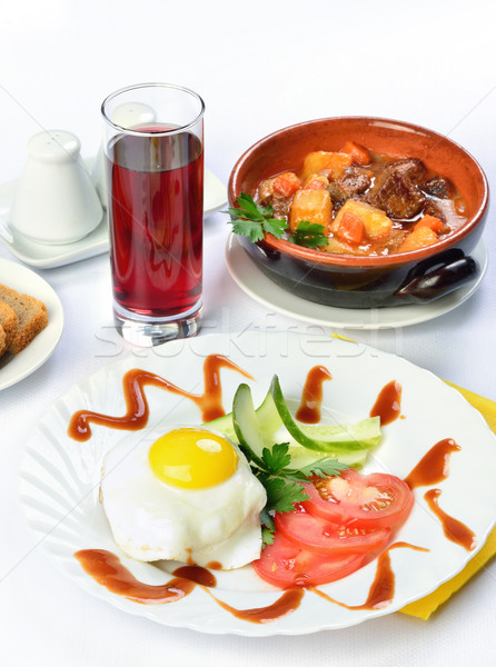 Still life of setout table with soup in ceramic pots, scrambled  Stock photo © Pilgrimego