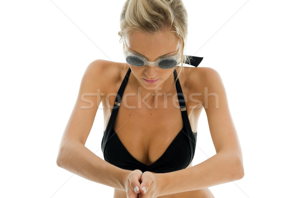 Stock photo: sportwoman in swimsuit with swimming goggles