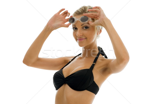 Stock photo: sportwoman in swimsuit with swimming goggles