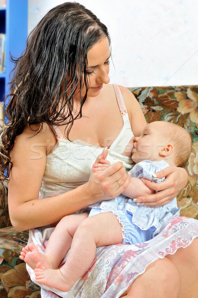Gyönyörű anya szoptatás újszülött baba nő Stock fotó © Pilgrimego