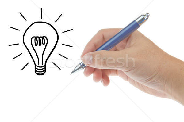 Mannelijke hand pen gloeilamp geïsoleerd witte Stockfoto © pinkblue