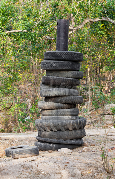stack of worn out rubber tire with pole Stock photo © pinkblue