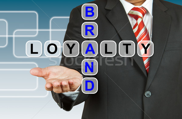 Businessman hand drawing Brand Loyalty Stock photo © pinkblue