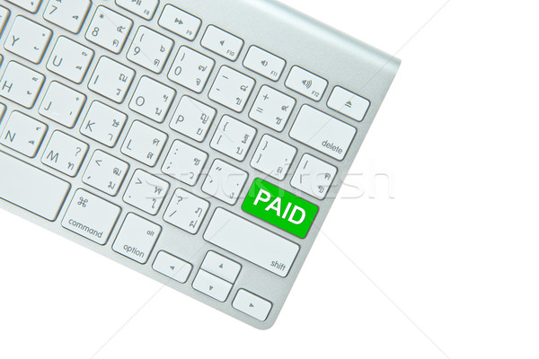 Zöld fizetett gomb számítógép billentyűzet izolált fehér Stock fotó © pinkblue