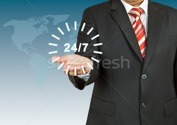 Businessman with 24 hour circle Stock photo © pinkblue