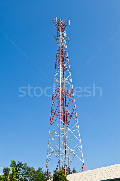 Mobile phone communication repeater antenna tower in blue sky Stock photo © pinkblue