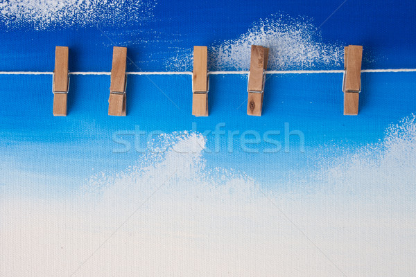 Photo Clip Hanging on Blue Sky Drawing Stock photo © pinkblue