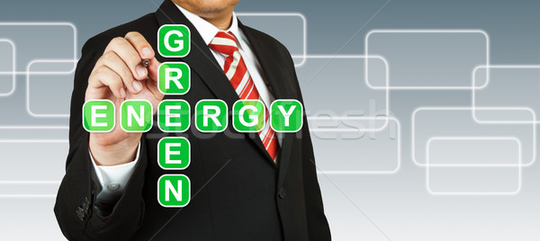 Stock photo: Businessman hand drawing Green Energy